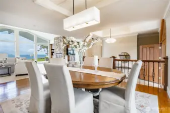 Formal dining space opens to living