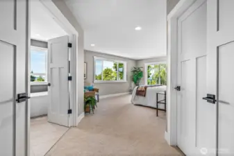 Double door entry to Primary Suite...you can already see the water views from each window.