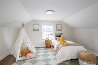 Cozy upper bedroom retreat with flexible layout.