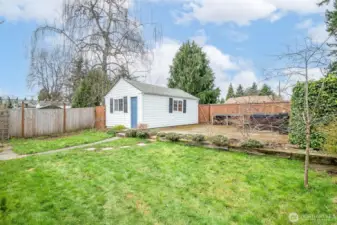 Expansive full fenced backyard, a rare North Tacoma space.