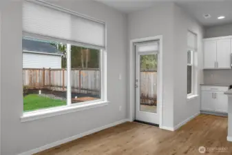 Convenient access to the covered area leading to the expansive patio.