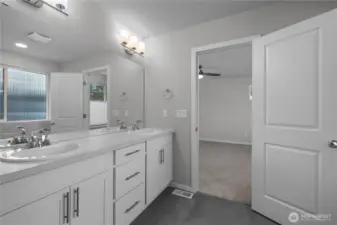 Bright and well-maintained bathroom serving additional bedrooms.