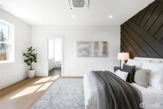 Large primary bedroom with an en suite bath and walk-in closet.