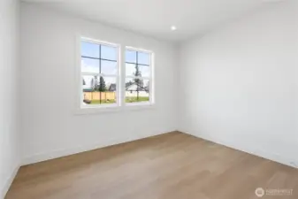 Bedroom #3 looking at the front yard.