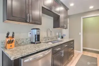 Beautiful kitchen counters and cabinets.