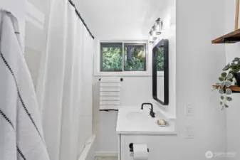 Main floor bath, fresh and new.