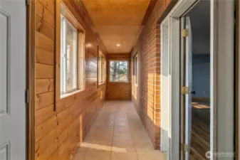 Entry with covered area.  Perfect spot for greenhouse or cozy coffee nook.