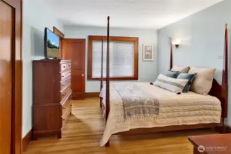 The main floor features a spacious primary bedroom with an attached bath, offering comfort and convenience all on one level.