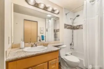 Granite and tile bathroom