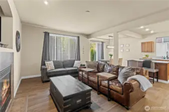 Living room flows to kitchen and dining room
