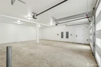 Huge garage, potentially could fit 4 vehicles or room for additional storage