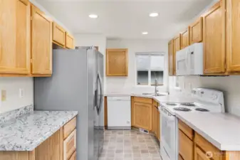 Bright and well lit kitchen with desk space