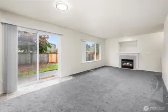 Gas fireplace and sliding door to back yard