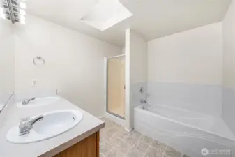 Primary bathroom, dual sinks, separate shower and soaking bathtub