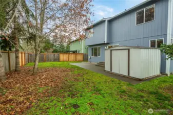 Other corner property view  Good sized patio..Beautiful foliage in spring and summer.  Shed offers extra storage.