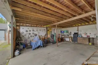 Inside 2 bays of carport