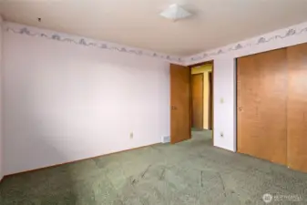 Second bedroom looking out to hallway.
