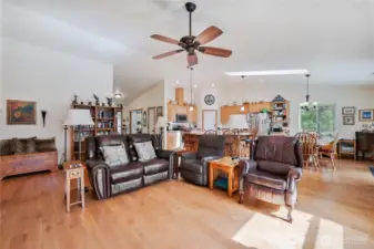 The perfect gathering space, with vaulted ceiling and cozy woodstove.