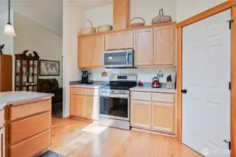 The kitchen is well designed and accommodates multiple cooks.  Notice the door to the convenient pantry.