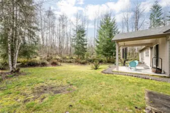 Covered patio for shade or drizzle.