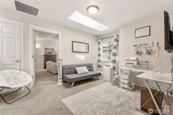 As you head upstairs, you will find this generous loft/landing area! Perfect for gaming, homework, another TV, home office...the skylight is a real plus.
