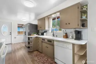 Kitchen sink has view of oversized back yard