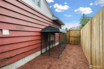 Dog run right off the side entry ready for your pup.