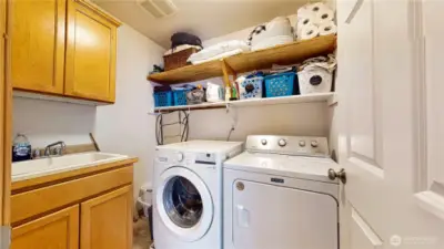 Up-stairs utility room w/ laundry sink