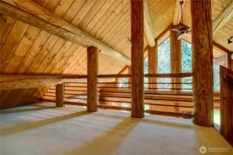 This loft area has lots of possible uses.