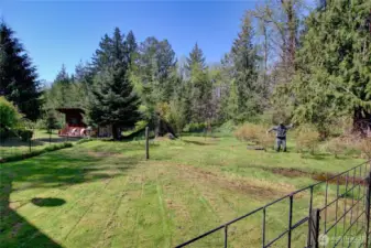 Fenced in area for animals or a garden.
