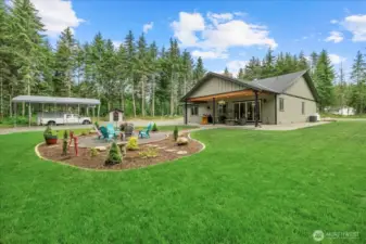 Imagine all your summer gatherings under the covered porch and next to the fire pit!  Do I smell the S'mores already?
