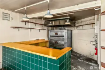 counter and commercial pizza oven included.