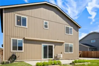 Extra large patio extends to the side of the home AND has a retractable awning to give you shade from the sun!