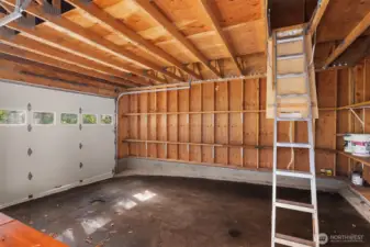 Garage with ladder storage area