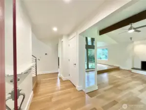 Truly a rare home with an amazing flow and feel. Light filled entry with gorgeous new wide plank (real) hardwood flooring throughout.