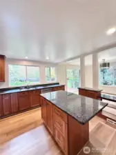 With rich cabinetry, durable granite counters and tons of storage you will feel like a celebrity chef in this gorgeous and highly functional kitchen.