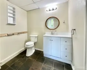 Lower level 1/2 bath and laundry room.