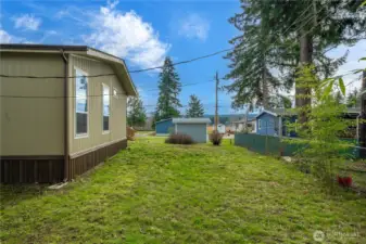 Spacious yard offers room to relax, garden, or enjoy outdoor activities in a peaceful setting.