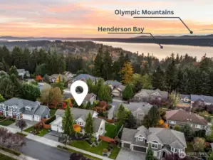 Aerial drone view of Horizon West gated community in North Gig Harbor highlighting the home’s location with proximity to Henderson Bay and scenic views of the Olympic Mountains—prime Gig Harbor real estate near Hwy 16, parks, and local amenities.