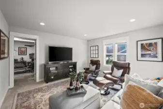 Spacious bonus media room in Horizon West home for sale in North Gig Harbor, leading into the second office—highlighting the home’s flexible floor plan and generous upstairs living space.