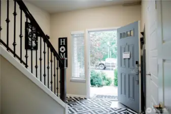 Welcoming front door entry leading to the front yard