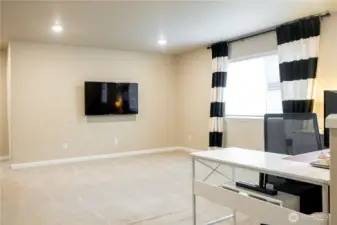 Spacious loft/rec room offering flexible living space