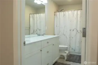 2nd level bathroom with double vanity sinks