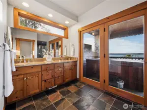 Transom windows bathe the bath in natural light