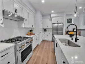 Kitchen comes with the desirable GE Monogram appliances as installed.