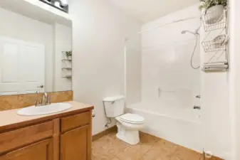 Full bathroom is updated and spacious.