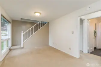 Stairs lead to loft and upper bedroom