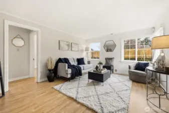 Spacious living room upon entry; door in the back goes to 2 bedrooms and 1 bath