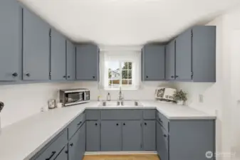 Tons of cabinet space; fresh updated color giving the kitchen a nice fresh look
