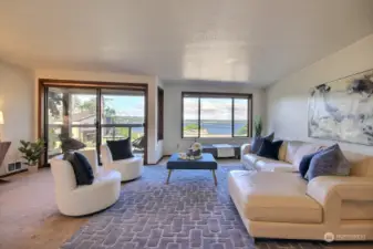 Step into this spacious, light-filled 2-bedroom, 1-bathroom condo with breathtaking views of Lake Washington, the Olympic Mountains, Mercer Island, glorious sunsets, and even eagles soaring by!